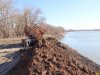 Грузовик высыпает грунт в реку Кубань 