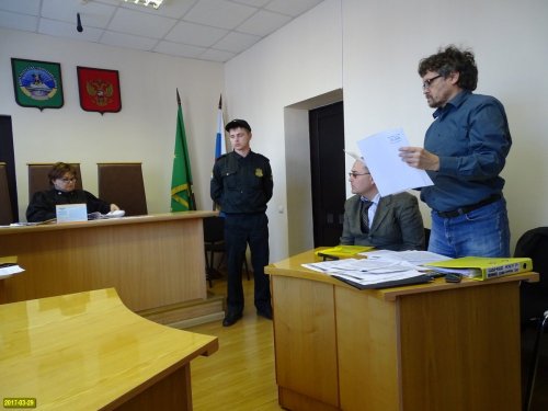 Андрей Рудомаха рассказывает судье о фальсификации СМС оповещения, якобы направленного в его адрес 