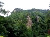 400 метровые скалы, густо обросшие нетронутыми лесами в памятнике природы регионального значения "Гуамское ущелье"