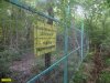 Заборы, построенные ООО "Эксим-М" в лесу возле Криницы, вопреки официальным ответам МПР Кубани стоят на месте