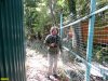 Координатор ЭВСК Андрей Рудомаха возле забора, незаконно установленного компанией ООО "Эксим-М" в лесу возле Криницы