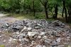 Лесная территория, незаконно розданная администрацией Геленджика под застройку, частично покрыта свалками мусора