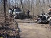 Пробиваясь по лесной дороге, УРАЛ с чиновниками застрял в грязи