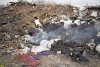 Незаконная свалка отходов в Калининском районе пополняется и местами горит