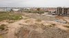 Завалы строительных отходов на месте снесённых в 2020 году незаконных построек на Благовещенской косе