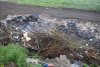 Ветви деревьев и автопокрышки - горючие отходы на незаконной свалке ТКО (Славянск-на-Кубани)